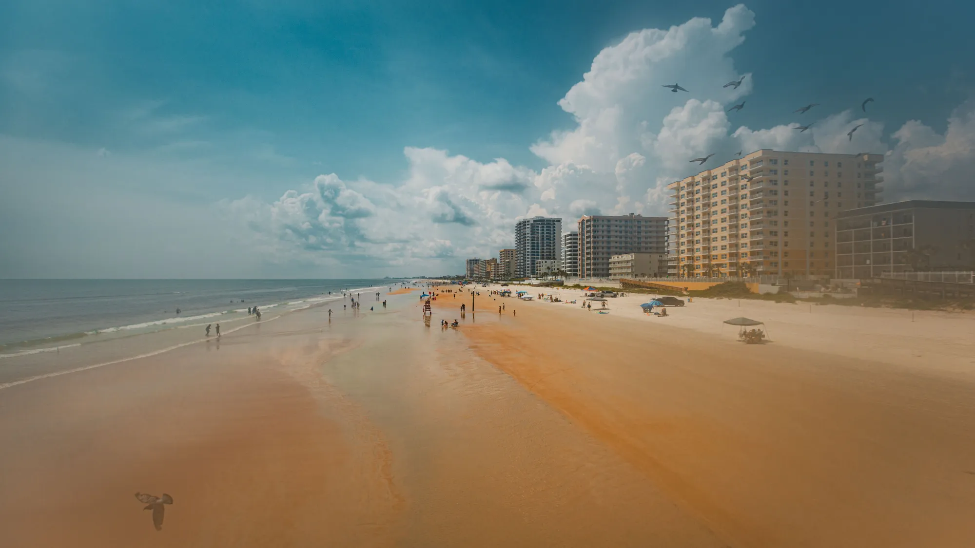The shore and beachfront hotels at Daytona Beach, Florida, from above